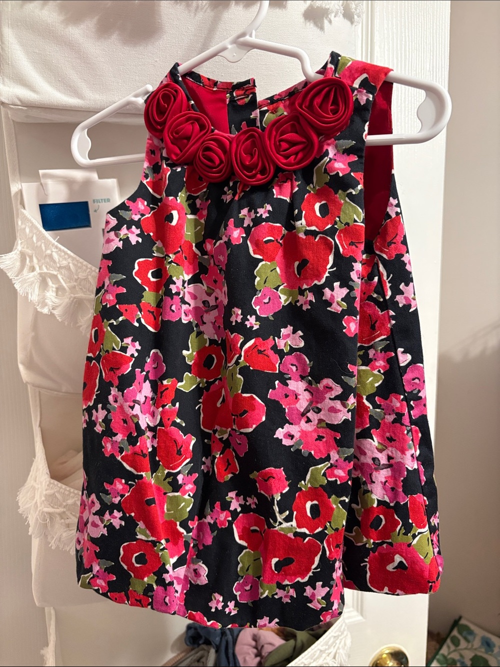 Place Black Floral Dress with Red Rosette Neckline